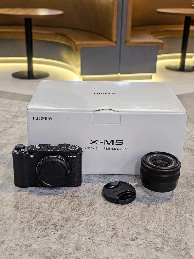 Fujifilm XM5 + 15-45mm (Category: Cameras) located in Baguio. Submitted by aeralecamerastore (Listing ID 1456161963, Image 2). Description: Fujifilm XM5 + 15-45mm P 52500 Location : Baguio / Makati / Cubao / BGC No issues Good as new No dents / scratches Shutter Count - 6K only Actual Photos Posted Open For Cash on delivery / COP LBC Inclusions: What’s Included? Fujifilm XM5 + 15-45 Original Box Receipt Strap Camera Bag.