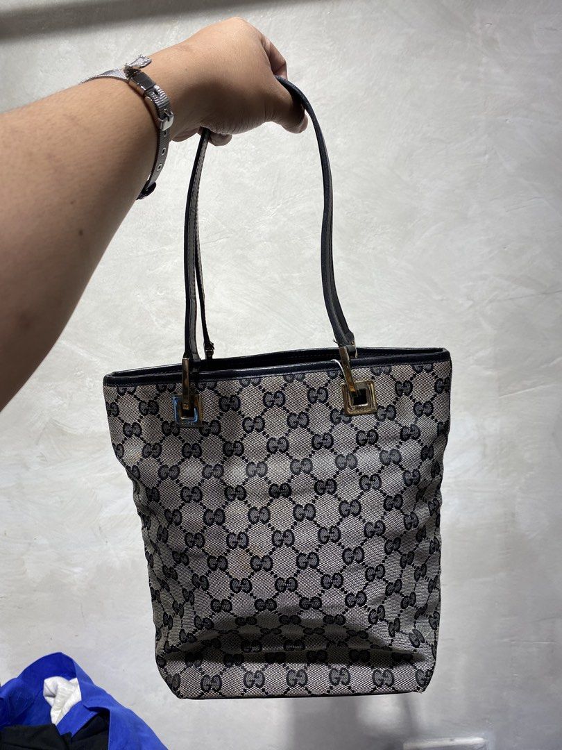 Gucci GG Canvas Mini Tote Bag (Category: Luxury Bags & Wallets) located in Quezon City. Submitted by rebirthalley (Listing ID 1456091559, Image 3). Description: Verygood Condition Authentic Gucci Signs of use.