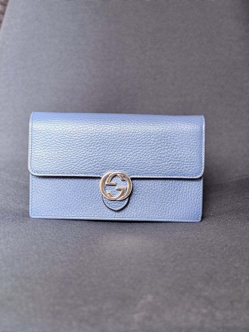 Gucci Interlocking G Wallet Blue Leather (Category: Luxury Bags & Wallets) located in Quezon City. Submitted by dasha25 (Listing ID 1456177591, Image 1). Description: - Authentic blue leather Gucci wallet on chain - Features the iconic interlocking G logo - Shows minor wear on the corners - Plenty of life left for everyday use.