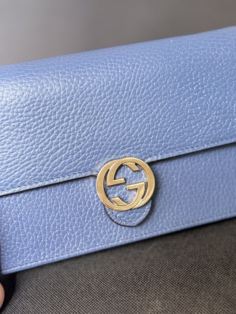 Gucci Interlocking G Wallet Blue Leather (Category: Luxury Bags & Wallets) located in Quezon City. Submitted by dasha25 (Listing ID 1456177591, Image 3). Description: - Authentic blue leather Gucci wallet on chain - Features the iconic interlocking G logo - Shows minor wear on the corners - Plenty of life left for everyday use.