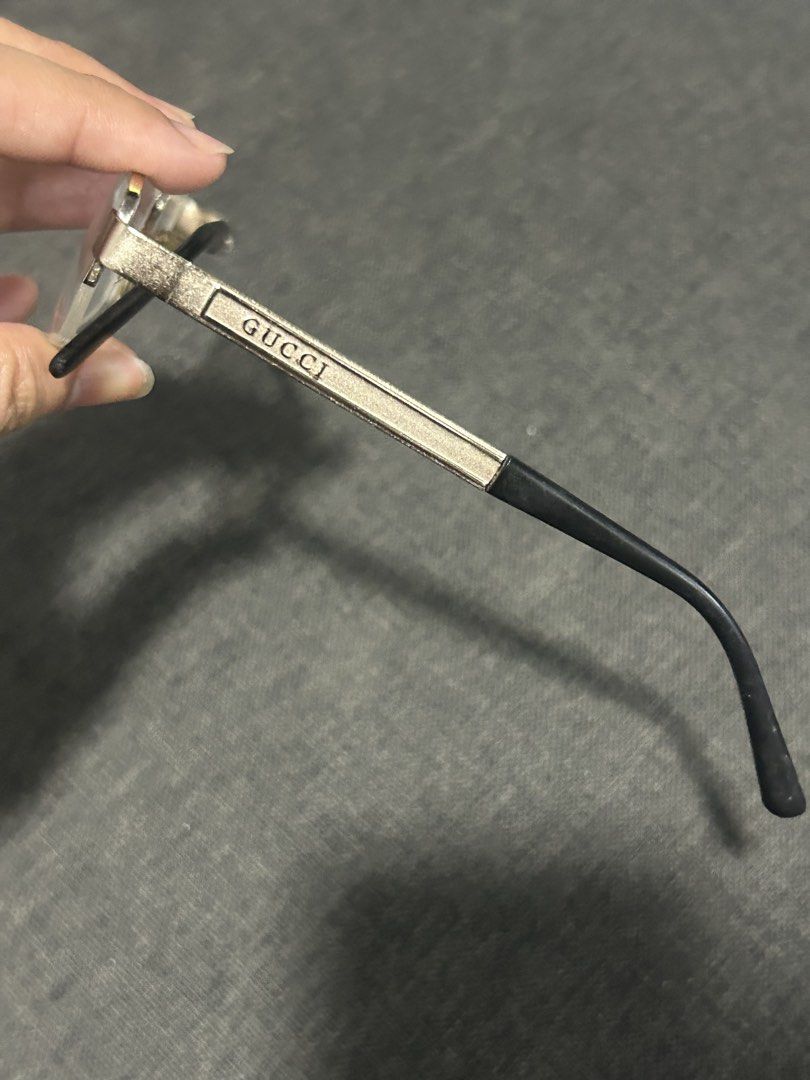 Gucci Rectangular metal-framed eyeglasses with clear lenses and black temple tips (Category: Sunglasses & Eyewear) located in General Trias. Submitted by aprilocampo0412 (Listing ID 1456190737, Image 3). Description: GucciRectangular metal-framed eyeglasses with clear lenses and black temple tips.