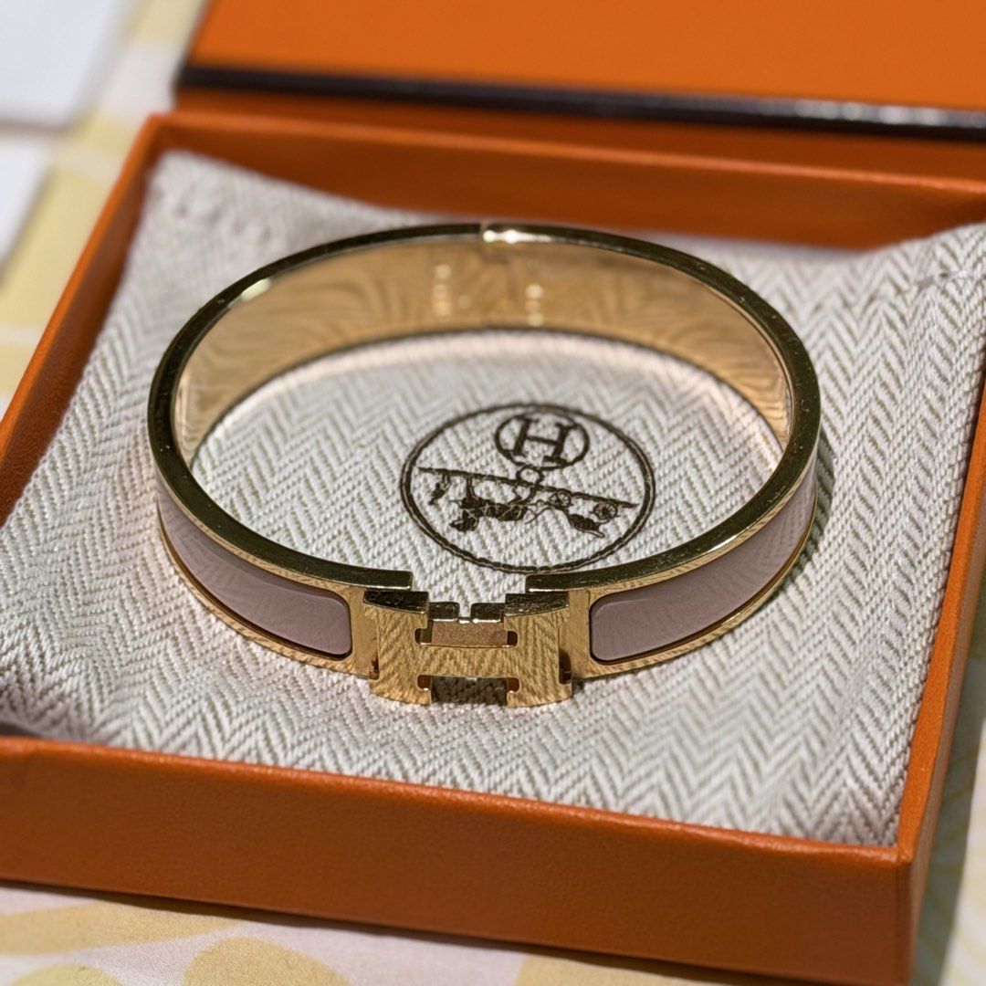 Hermes Clic H Bracelet (Category: Luxury Accessories) located in Taguig. Submitted by nopenotjo (Listing ID 1456170062, Image 1). Description: ghw - some of the ppf are still intact swipre right for more detailed photos inclusions: • box • dustbag • booklet • ribbon .