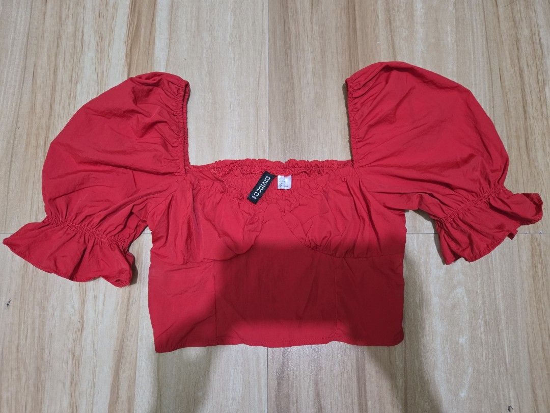 H&M DIVIDED RED PUFF SLEEVE BUSTIER STYLE CROPTOP (Category: Others Tops) located in Balanga. Submitted by ms.parkfilter (Listing ID 1456180507, Image 1). Description: H&M DIVIDED RED PUFF SLEEVE BUSTIER STYLE CROPTOP SIZE 32 | XXS ON TAG (CAN ALSO FIT TO XS-SMALL BODYFRAME) SQUARE NECKLINE and VOLUMINOUS SHORT PUFFSLEEVE WITH RUFFLED ELASTIC HEM NEVER USED NO ISSUE NO WHEN WORN PHOTO.