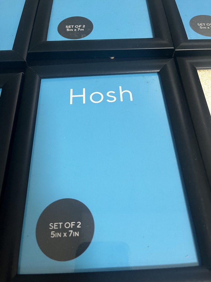 Hosh Photo Frames Set of 6 (Category: Frames & Pictures) located in Pasig City. Submitted by st_03 (Listing ID 1456160155, Image 2). Description: - Set of 6 Hosh photo frames - Fits 5in x 7in photos - Ideal for event decorations or home display - sample of one with a table number design for events - Features built-in stands for tabletop use - Used only once for an event.