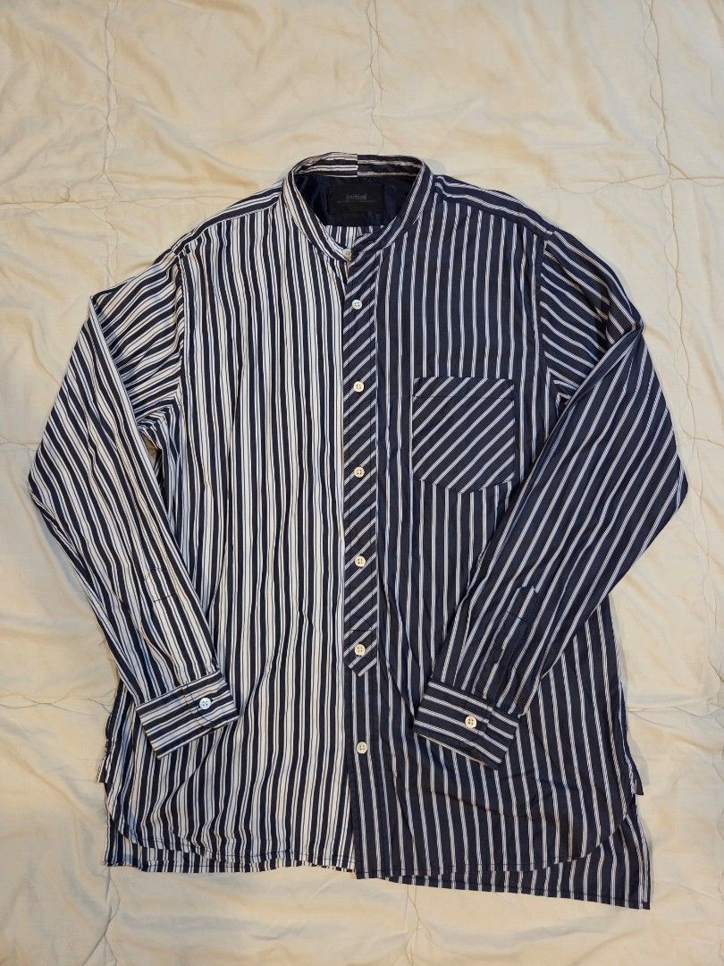 Initial Mismatch Stripes Collarless Long Sleeve Shirt (Category: Tshirts & Polo Shirts ) located in Taguig. Submitted by mightydept (Listing ID 1456138237, Image 1). Description: - Brand: Initial - Style: Long sleeve shirt - Design: Mix of thin and thick stripes - Features: Chest pocket, button-up front - Versatility: Ideal for casual or smart-casual outfits - Pairing: Looks great with jeans or trousers.