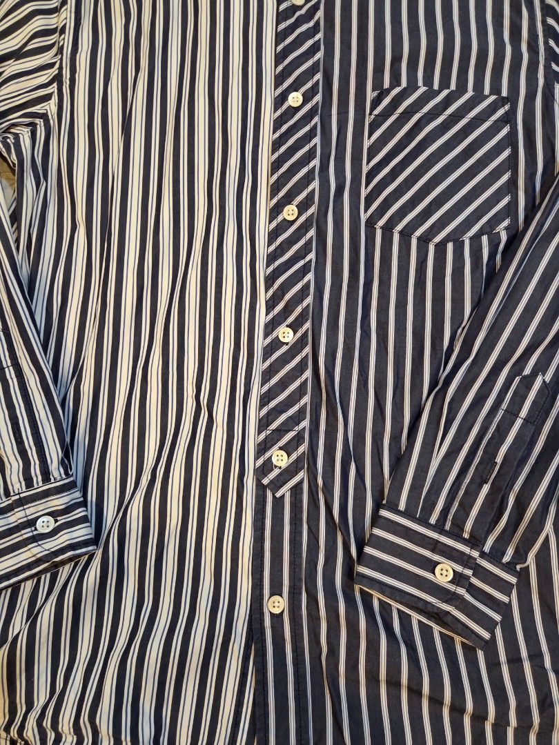 Initial Mismatch Stripes Collarless Long Sleeve Shirt (Category: Tshirts & Polo Shirts ) located in Taguig. Submitted by mightydept (Listing ID 1456138237, Image 3). Description: - Brand: Initial - Style: Long sleeve shirt - Design: Mix of thin and thick stripes - Features: Chest pocket, button-up front - Versatility: Ideal for casual or smart-casual outfits - Pairing: Looks great with jeans or trousers.