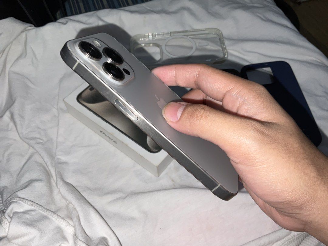 iPhone 15 Pro 256GB (Category: iPhone 15 Series) located in Caloocan City. Submitted by jhanxel (Listing ID 1456083913, Image 3). Description: Selling my personal iPhone 15 Pro in Natural Titanium No issue No repair history Openline (any sim will do) - 256GB - Natural Titanium - Battery Health: 82% - Condition: 100% smooth, no issues, no repair history, all features -working perfectly (Face ID, True Tone, cameras, etc.) Inclusions: Original Box O