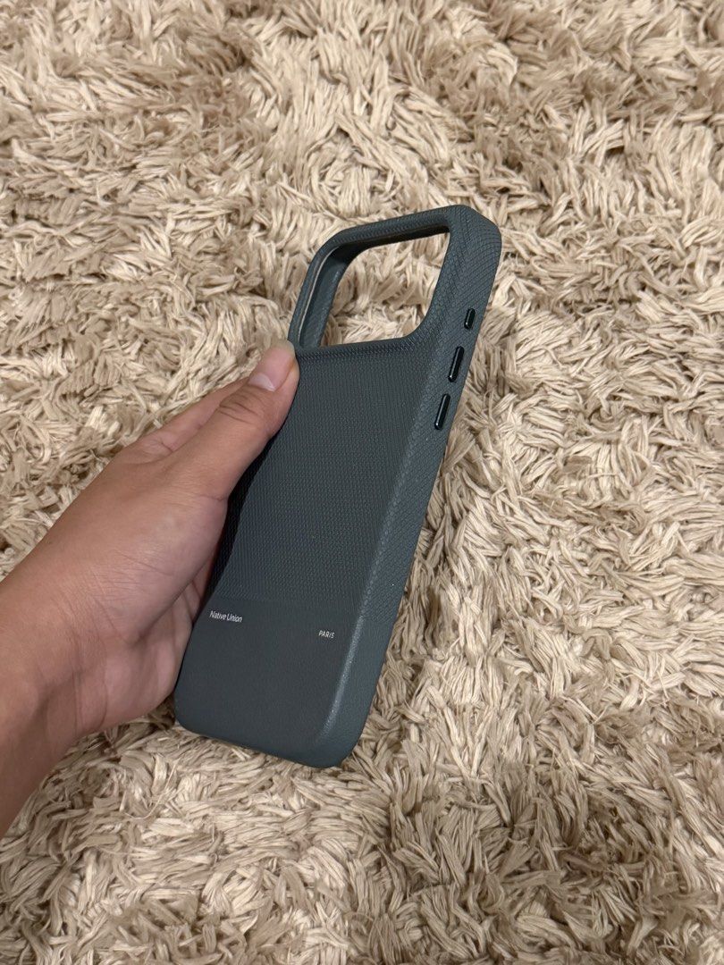 iPhone 17 Pro Max Case - Native Union (Category: Cases & Sleeves) located in Makati City. Submitted by bellestylespace (Listing ID 1456225059, Image 3). Description: Native Union Case - Slate Green Used a few times with a minor flaw on the camera button hence selling low (see pic for reference) MOP: BPI/BDO.