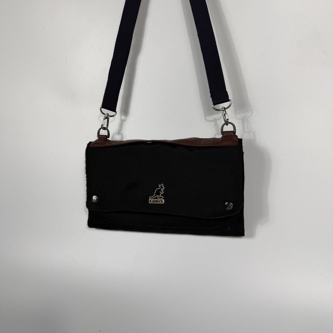 Kangol Glamping Cross Body Bag (Category: Sling Bags) located in Bacolod City. Submitted by freshstuff13 (Listing ID 1456218122, Image 3). Description: Kangol Glamping Cross Body Bag Excellent Condition Black crossbody bag with a top handle, Neat shape. Flap bag with numerous pockets and layers inside for different stuff. DM if interested 📩.
