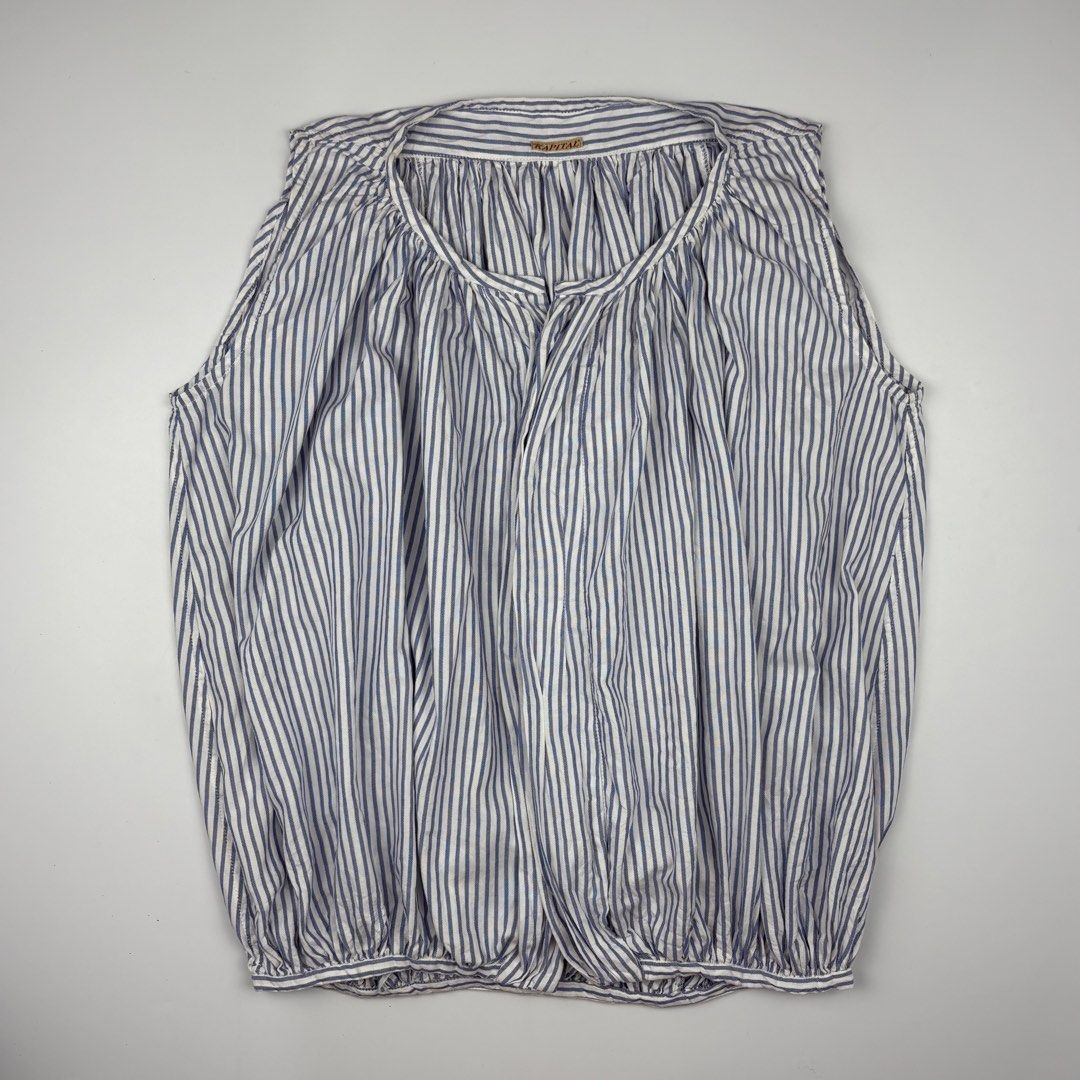 Kapital Striped Sleeveless Balloon Blouse (Category: Luxury Apparel) located in Bacolod City. Submitted by cast.archives (Listing ID 1456165014, Image 1). Description: Kapital Striped Sleeveless Balloon Blouse Size: Small to medium Condition: Excellent Flaw: none.