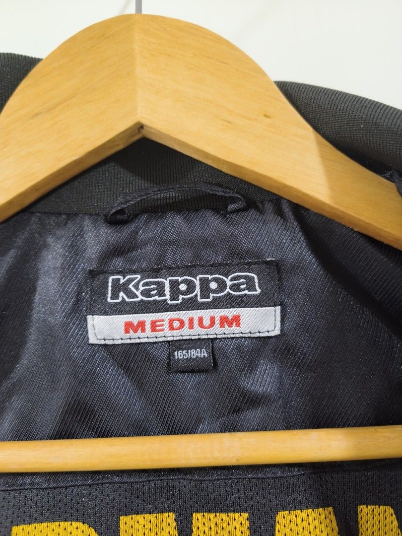 Kappa Germany Track Jacket Bomber Black Medium (Category: Babies & Kids Fashion) located in Iloilo. Submitted by minemo216 (Listing ID 1456097312, Image 2). Description: L 22.5 x W 18.5 - Black Kappa track jacket - Size: Medium - Features Germany crest - German flag colors on zipper and buttons - Kappa logo on sleeves - Zippered chest pocket - Ideal for Germany fans.