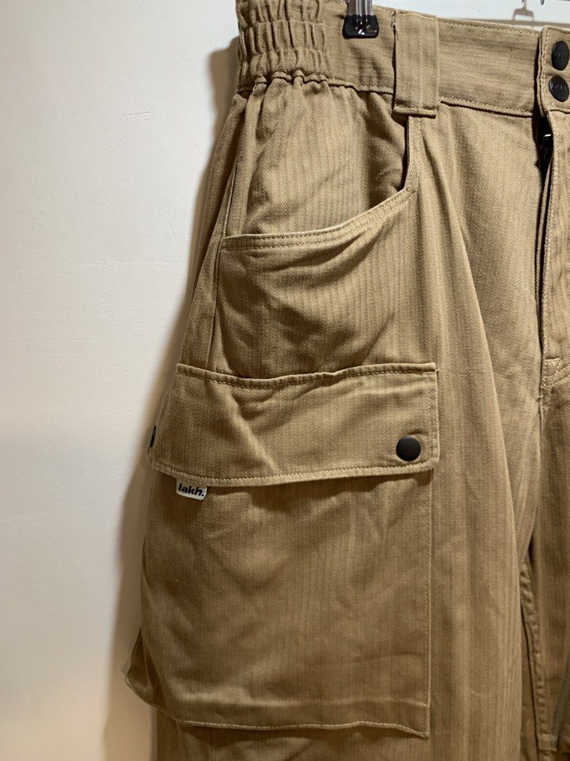 Lakh Supply Herringbone Multipocket Utility Pants (Category: Chinos) located in Bacolod City. Submitted by moboandmoga (Listing ID 1456102211, Image 3). Description: Lakh Supply Herringbone Cargo Utility Wide Pants Size: 30-32 (Garterized) Excellent Condition! (Sizing info) Length: 40.5 inches Leg op: 9" .