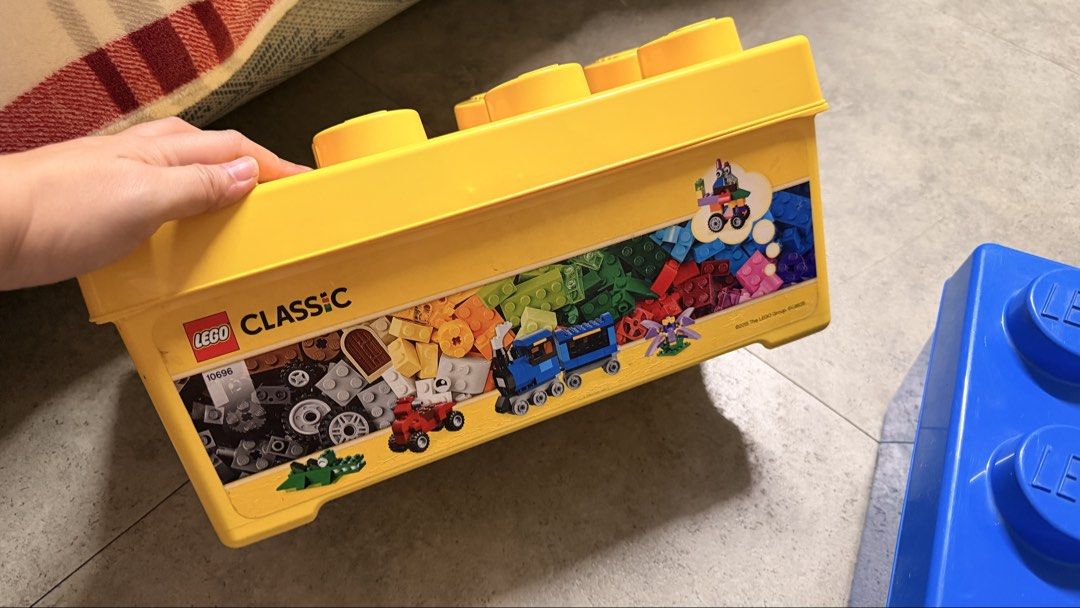 LEGO Classic Storage Brick Boxes (Yellow & Blue) (Category: Lego & Building Sets) located in Cavite. Submitted by rhea0218 (Listing ID 1456145964, Image 3). Description: - Two LEGO storage brick boxes (1 yellow, 1 blue) - Shaped like giant LEGO bricks - Ideal for organizing toys and LEGO bricks - Yellow box features LEGO Classic branding and model 10696 - Both boxes are empty and ready for use TAKE ALL AS IS NA .