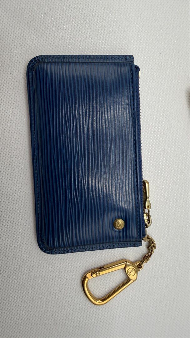 Louis Vuitton Blue Epi Leather Key Cles (Category: Luxury Bags & Wallets) located in Pasig City. Submitted by shoptilyoudrop87 (Listing ID 1456176792, Image 3). Description: - Authentic Louis Vuitton Key Cles - Made with luxurious Epi leather - Deep blue color - Comes with original Louis Vuitton box and dust bag - Features a stylish gold-tone zipper - Includes a key ring with clasp - Interior stamped 'Louis Vuitton Paris made in France - Ideal fo