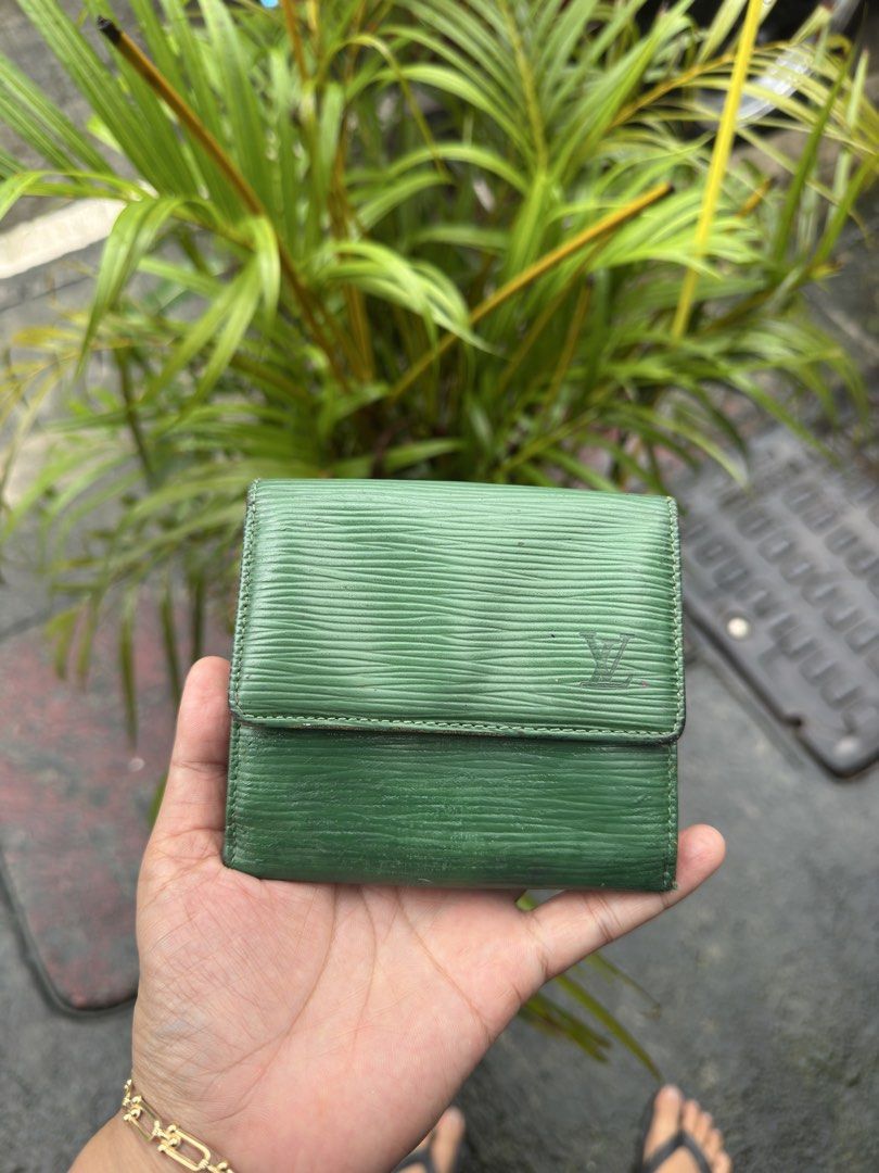 Louis Vuitton Green Epi Bifold Wallet (Category: Wallets & Card holders) located in Manila. Submitted by dripdistrict (Listing ID 1456114287, Image 1). Description: Authentic Bifold Wallet What you see is what you get You will se what’s the issue already in the picture Pm for more Details .