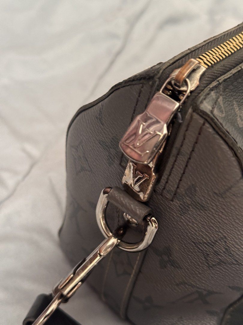Louis Vuitton Monogram Canvas City Keepall Bag (Category: Luxury Bags & Wallets) located in Bacolod City. Submitted by luxejones (Listing ID 1456058144, Image 3). Description: - Louis Vuitton Keepall Bandouliere - Dark grey monogram canvas - Zipper closure - Adjustable shoulder strap included - Some wear on zipper trim and piping - Please check photos for detailed condition - with box and dustbag.