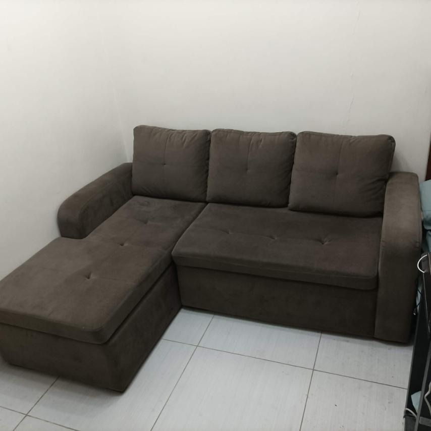 L-Shaped Sofa (Category: Sofas) located in Mandaluyong City. Submitted by crimsonblake (Listing ID 1456184726, Image 3). Description: - Dark grey L-shaped sofa - Comfortable seating for multiple people - Ideal for living rooms or apartments - Original Price is 25k -RFS: decluttering - Buyer will pickup item .