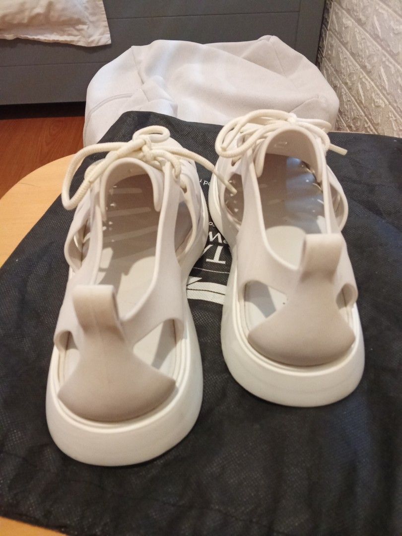 Melissa White Jelly Lace-Up Platform Sandals (Category: Flats & Sandals) located in Las Pinas. Submitted by Gienuine (Listing ID 1456125251, Image 3). Description: - White Melissa jelly sandals - Lace-up front - Platform sole for added height - Super comfy for casual wear - Easy-to-clean material - Perfect for summer days - NO BOX.