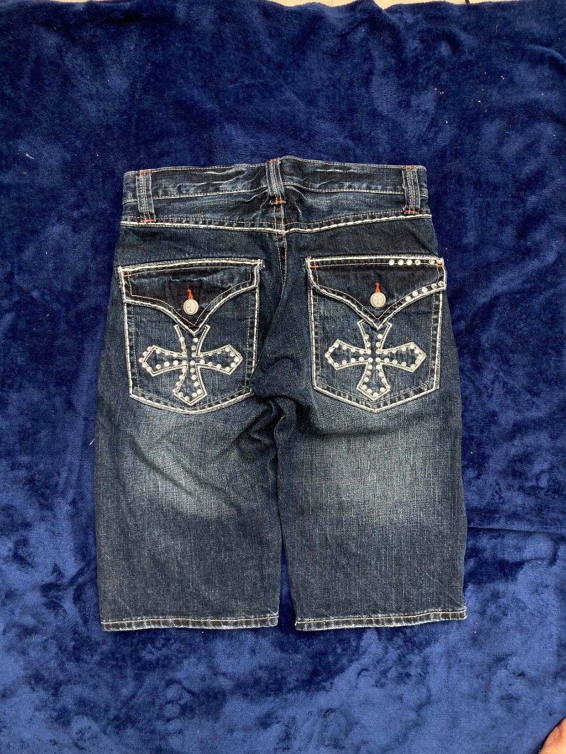 Men's Embellished Denim Shorts (Category: Shorts) located in Naga. Submitted by grunchieeeerr (Listing ID 1456106706, Image 1). Description: Dark wash denim shorts with silver stud and cross embroidery on back pockets. Orange contrast stitching. Button/zip closure. Minor storage creases. Perfect for casual outfits. 32x24.