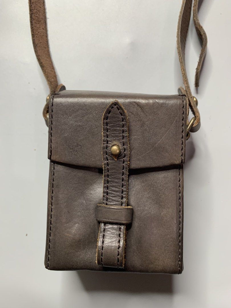 Mihara Yasuhiro x Canon Sling Bag (Category: Sling Bags) located in Binan City. Submitted by hybrid_archival_theory (Listing ID 1456186418, Image 2). Description: Mihara Yasuhiro Leather Camera Bag Collaboration With Canon Rare Piece Limited edition USED Measurements- Height- 9 cm Width- 8 cm No Inclusions Bag only Please Check Detailed Photos Posted For Your Reference Thankyou! •is a Miharayasuhiro Leather Camera Bag, specifically created as a r
