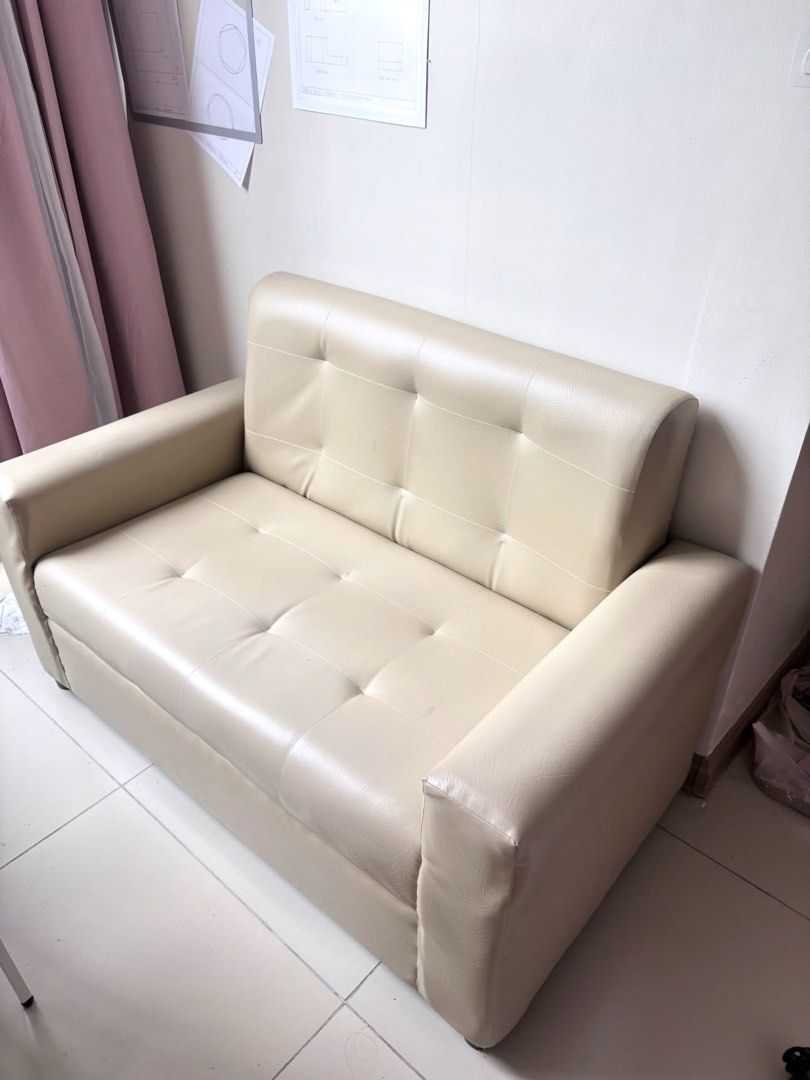 mini sofa (Category: Sofas) located in Quezon City. Submitted by reiloved (Listing ID 1456085877, Image 1). Description: cream 2-seater mini sofa for sale 🛋️🤍 📏 46 × 25 inches 📍 Taft, Manila ✨ comfy & perfect for condo/dorm has a small tear sa armrest but easily covered with a throw blanket! RFS: turning my room pink 🎀 literally the only reason HAHAHA 3k.