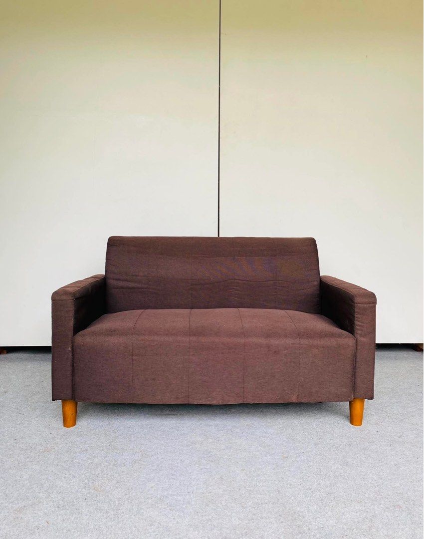 MINIMALIST 2-SEATER FABRIC SOFA (Category: Sofas) located in Manila. Submitted by _chinixx (Listing ID 1456167271, Image 1). Description: "JAPAN SURPLUS" MINIMALIST 2-SEATER FABRIC SOFA SIZE: 44L" x 24W" x 14Sh" x 26H" inches (AS-IS ITEM) IN GOOD CONDITION.