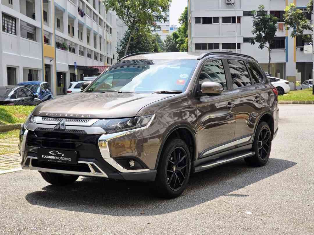 Mitsubishi Outlander 2.0 CVT Classic 7-Seater (A) (Category: Used Cars) located in Singapore. Submitted by platinummotoringsg (Listing ID 1456077568, Image 2). Description: Engine & gearbox warranty till END OF COE. Pristine condition unit with wear & tear done up. Serviced and maintained regularly at workshop. STA / Workshop PPI check more than welcomed for you to purchase with a peace of mind. Flexible financing options available including full