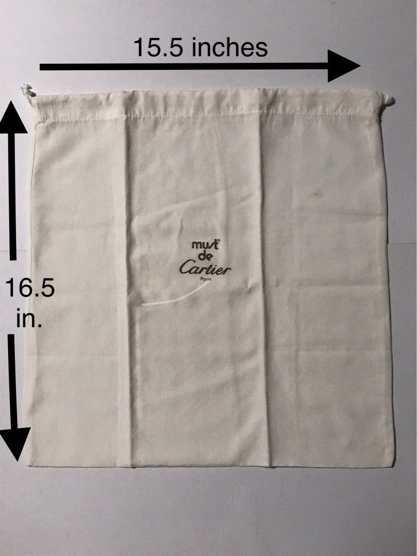 Must de Cartier Paris Dustbag (Category: Luxury Bags & Wallets) located in Manila. Submitted by iyasellsph (Listing ID 1456132498, Image 1). Description: Must de Cartier dustbag See size on photo Off-white cotton material Drawstring With 1 small brown storage mark Vintage in very good condition overall.