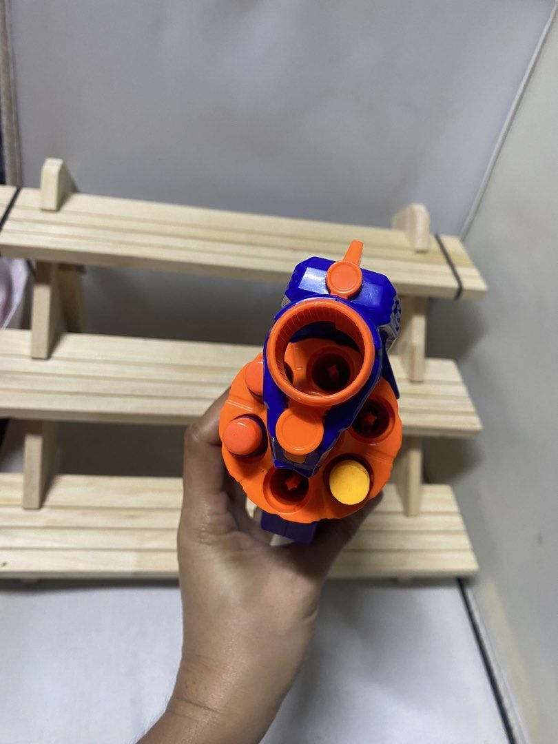 Nerf Elite Disruptor Blaster Toy Gun (Category: Action & Battle Toys) located in Pasacao. Submitted by wengpullar37205 (Listing ID 1456216160, Image 3). Description: - Blue and white Nerf Elite Disruptor blaster - Features an orange rotating barrel - Fires darts for exciting play - Perfect for kids and adults - Ready for action!.