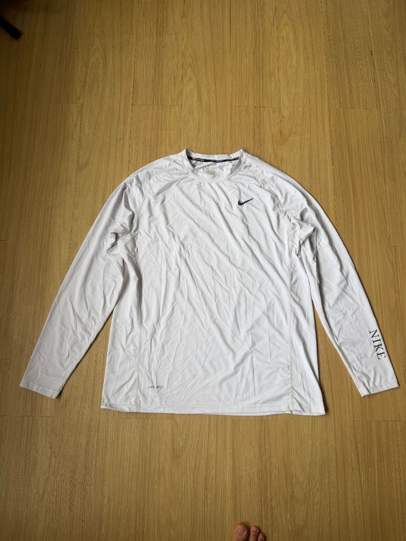 NIKE | Dri-FIT Compression longsleeves t-shirt (Category: Activewear) located in Pasig City. Submitted by franco.mendoza (Listing ID 1456123741, Image 1). Description: White Nike Dri-FIT running shirt. Lightweight, breathable, with classic swoosh. Perfect for runs and training. - issues: tag fading - 22 x 29 - size XXXL .