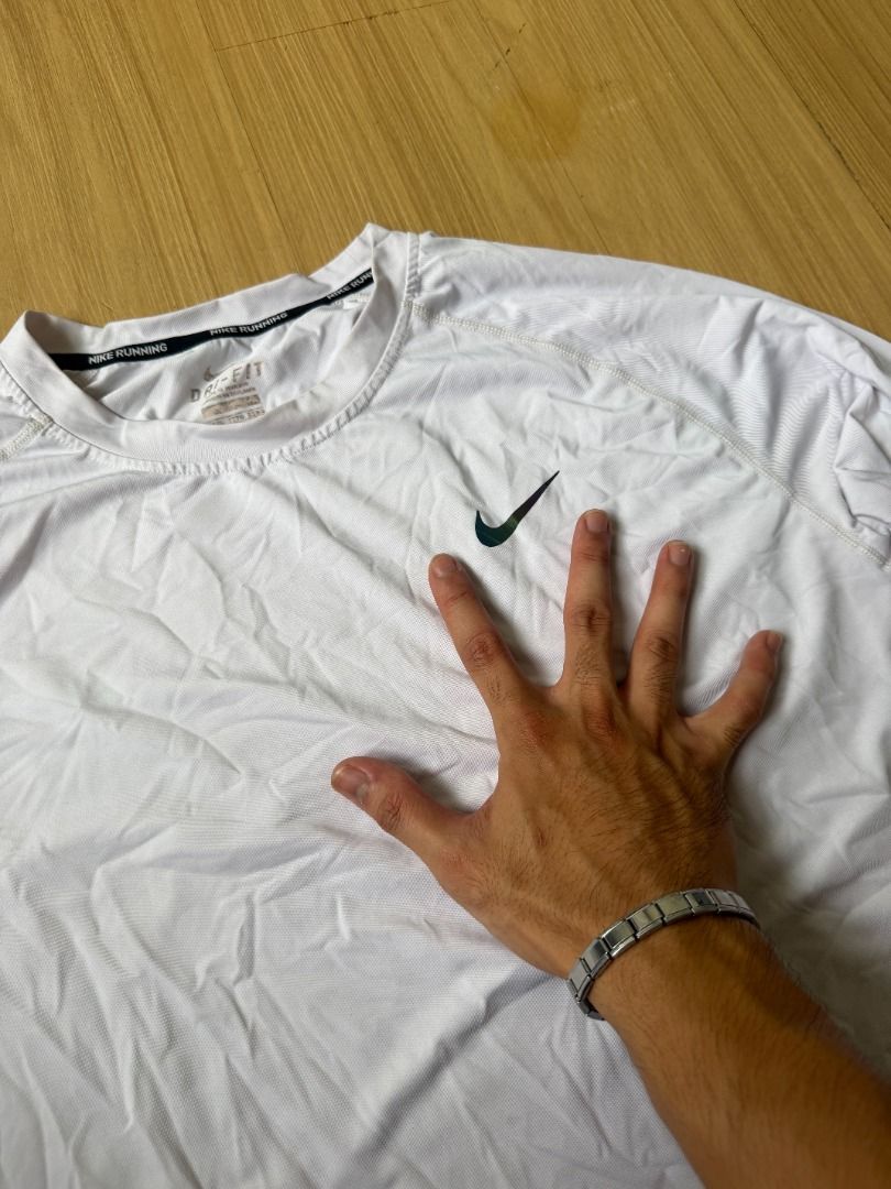 NIKE | Dri-FIT Compression longsleeves t-shirt (Category: Activewear) located in Pasig City. Submitted by franco.mendoza (Listing ID 1456123741, Image 3). Description: White Nike Dri-FIT running shirt. Lightweight, breathable, with classic swoosh. Perfect for runs and training. - issues: tag fading - 22 x 29 - size XXXL .