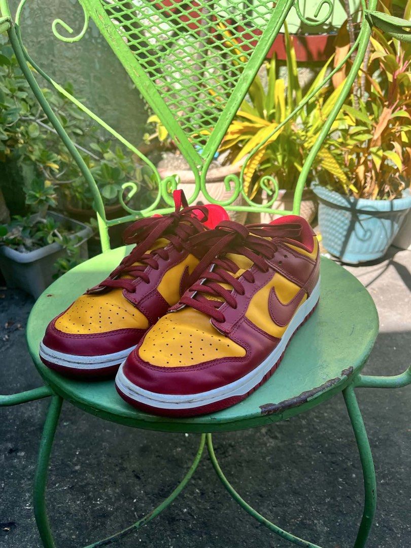Nike Dunk Low MIDAS GOLD Still Negotiable (Category: Sneakers) located in Victoria. Submitted by Tel_yuki (Listing ID 1456147332, Image 3). Description: - Classic Nike Dunks in burgundy and yellow - Low-top silhouette - Features red laces - Nike branding on the heel - Perfect for everyday casual wear - A truly dope pair of sneakers!.
