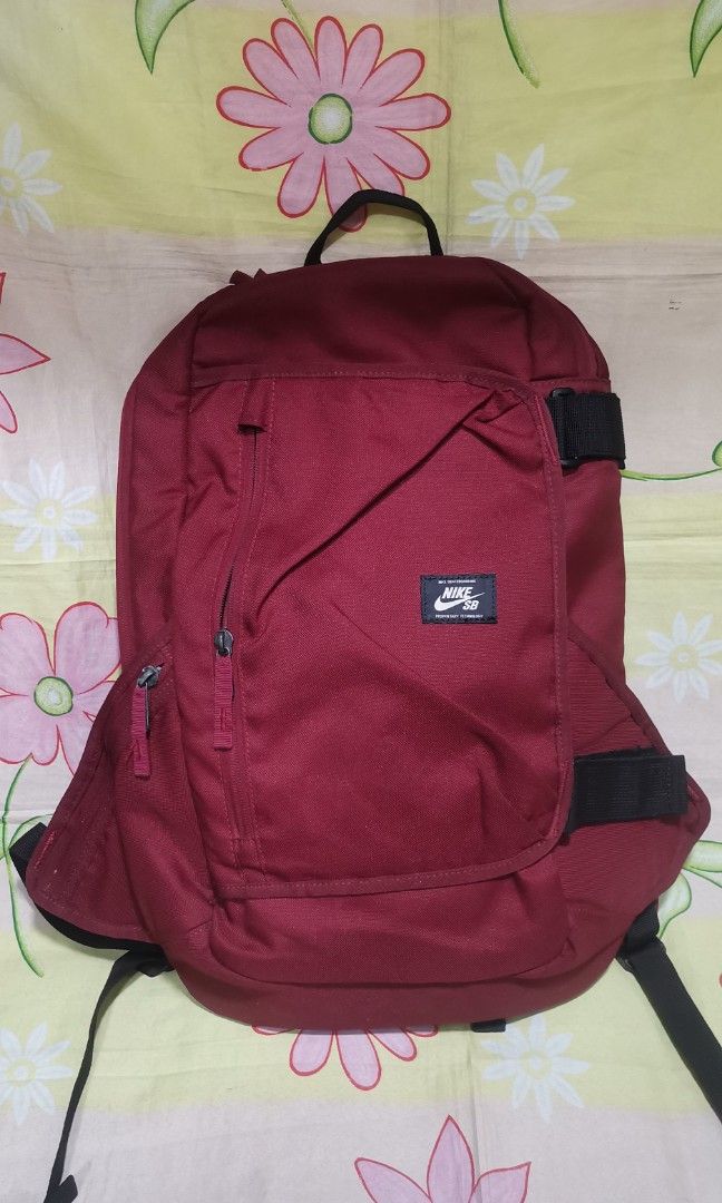NIKE SB dark red backpack bag (Category: Backpacks) located in Baguio. Submitted by princessjhade (Listing ID 1456151888, Image 1). Description: Excellent condition Plus shipping Medium largish.