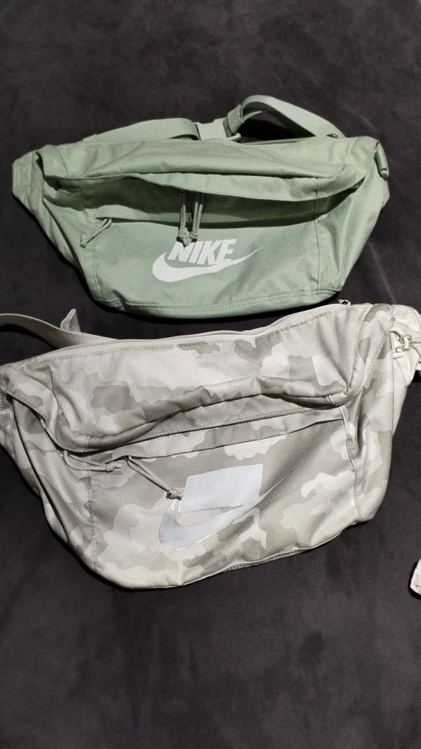 Nike Waist Bags & CRITIO Jacket (Category: Activewear) located in Davao. Submitted by jellisaiah.ocean (Listing ID 1456154472, Image 1). Description: - Two Nike waist bags: 1 mint green, 1 camouflage print. - Dark grey CRITIO jacket with hood. - Ideal for everyday wear and outdoor adventures. - Message us for more information!.