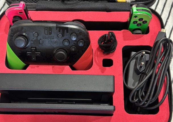 Nintendo Switch Controller Bundle (Category: Controllers) located in Singapore. Submitted by beamspace.com (Listing ID 1456197283, Image 2). Description: Letting go of a Nintendo Switch controller/accessories bundle in good condition. 🎮 Bundle includes: • Nintendo Switch Pro Controller – Splatoon 2 Edition • Nintendo Switch Joy-Con (L) Neon Green + (R) Neon Pink • Joy-Con straps × 3 • Nintendo Switch Joy-Con grip • USB/HDMI cables • Nintendo Swi