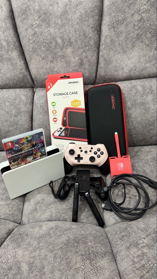 NINTENDO SWITCH OLED (Category: Nintendo) located in Kuala Lumpur. Submitted by greyxv01 (Listing ID 1456089672, Image 2). Description: 🎮 NINTENDO SWITCH OLED – FULL SET + 128GB MEMORY + MARIO KART 8 DELUXE Condition masih cantik & berfungsi dengan baik. Sesuai untuk yang nak terus main tanpa perlu beli aksesori tambahan. 📦 Apa yang dapat: * Nintendo Switch OLED White * Original Nintendo Switch Dock * Original Joy-Con White * Original Joy-Con G