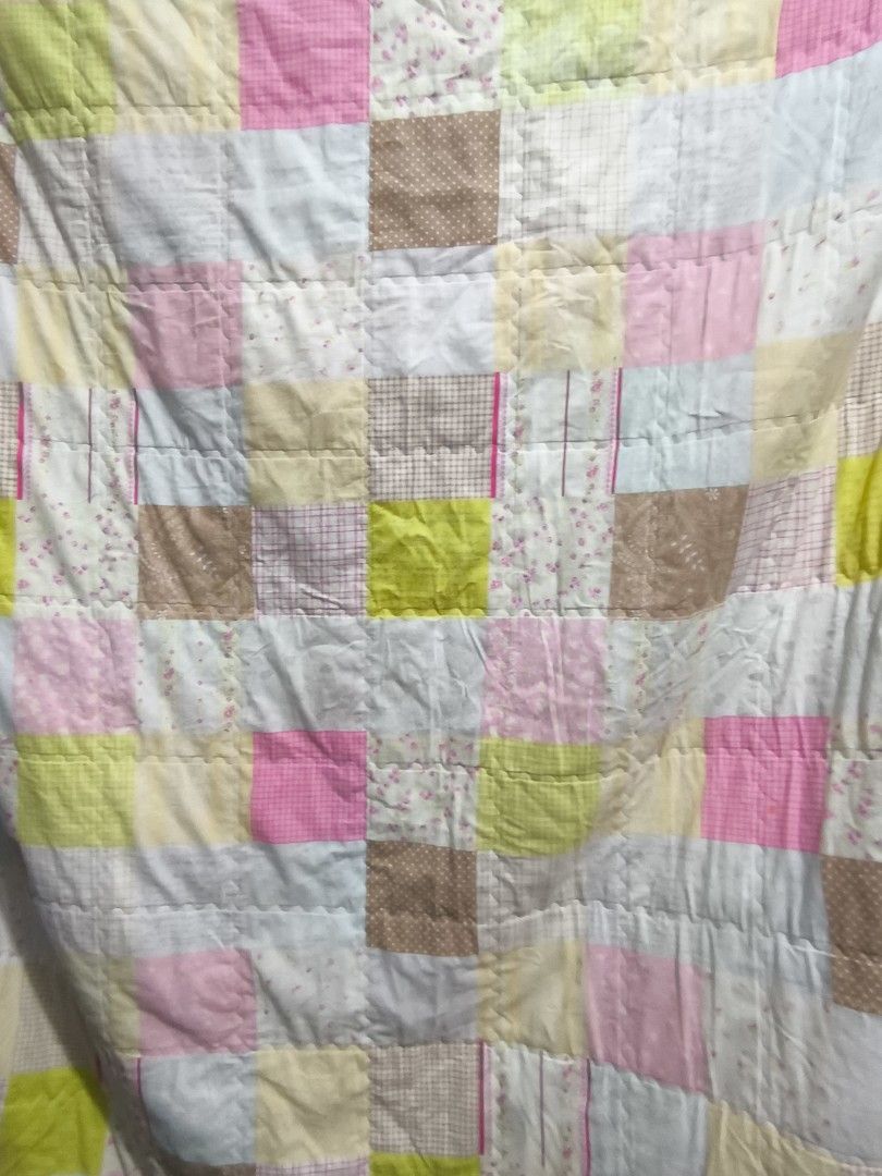 PASTEL CANDY PATCHWORK COMFORTER (Category: Bedding & Towels) located in Mandaluyong City. Submitted by strawfhairy (Listing ID 1456118548, Image 1). Description: issue needs wash. not sure sa size might be single/double ~ 700 auto yours.