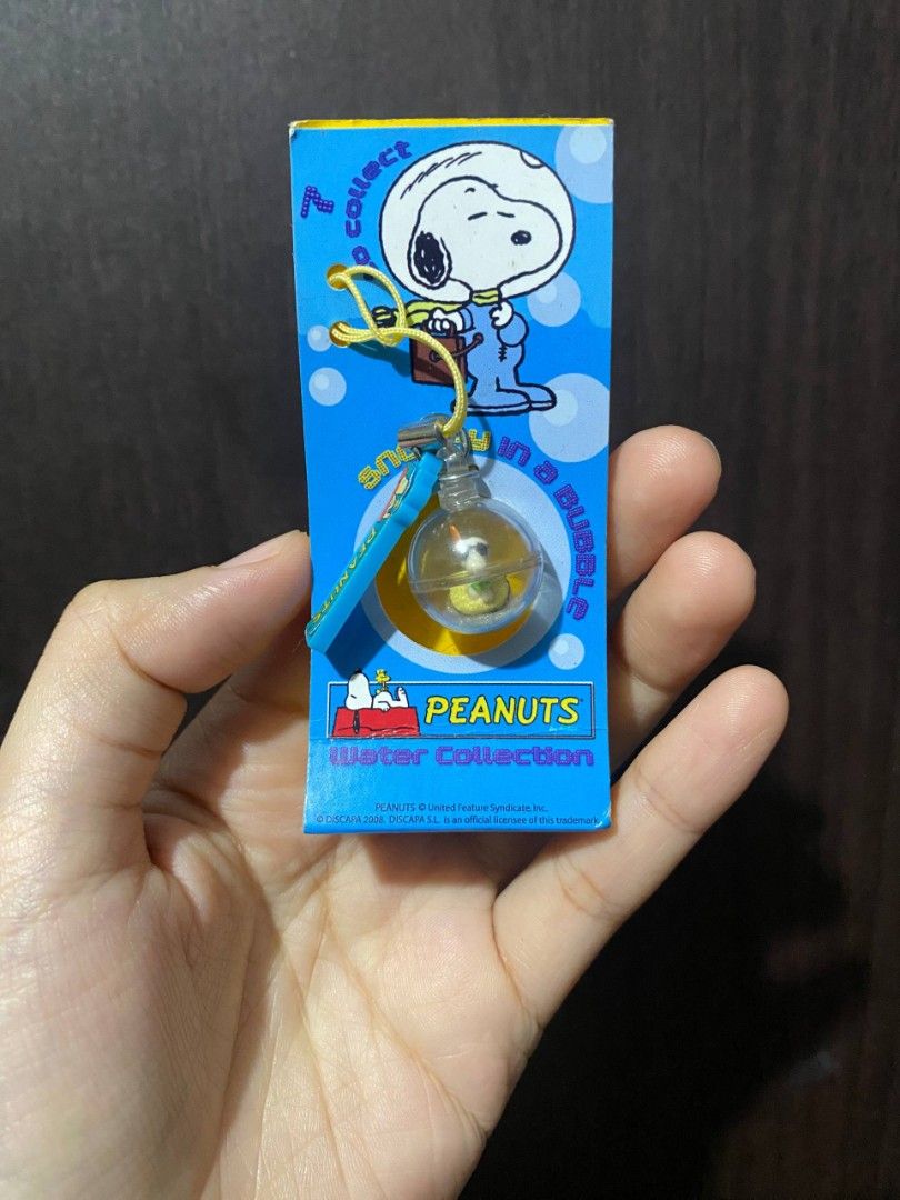 Peanuts Snoopy Water Collection Phone charm keychain (Category: Character Goods) located in Marikina City. Submitted by marisan.collection (Listing ID 1456217707, Image 1). Description: - never used and considered vintage no water inside of charm If you have any questions feel free to PM 🧸 Thank you po!.