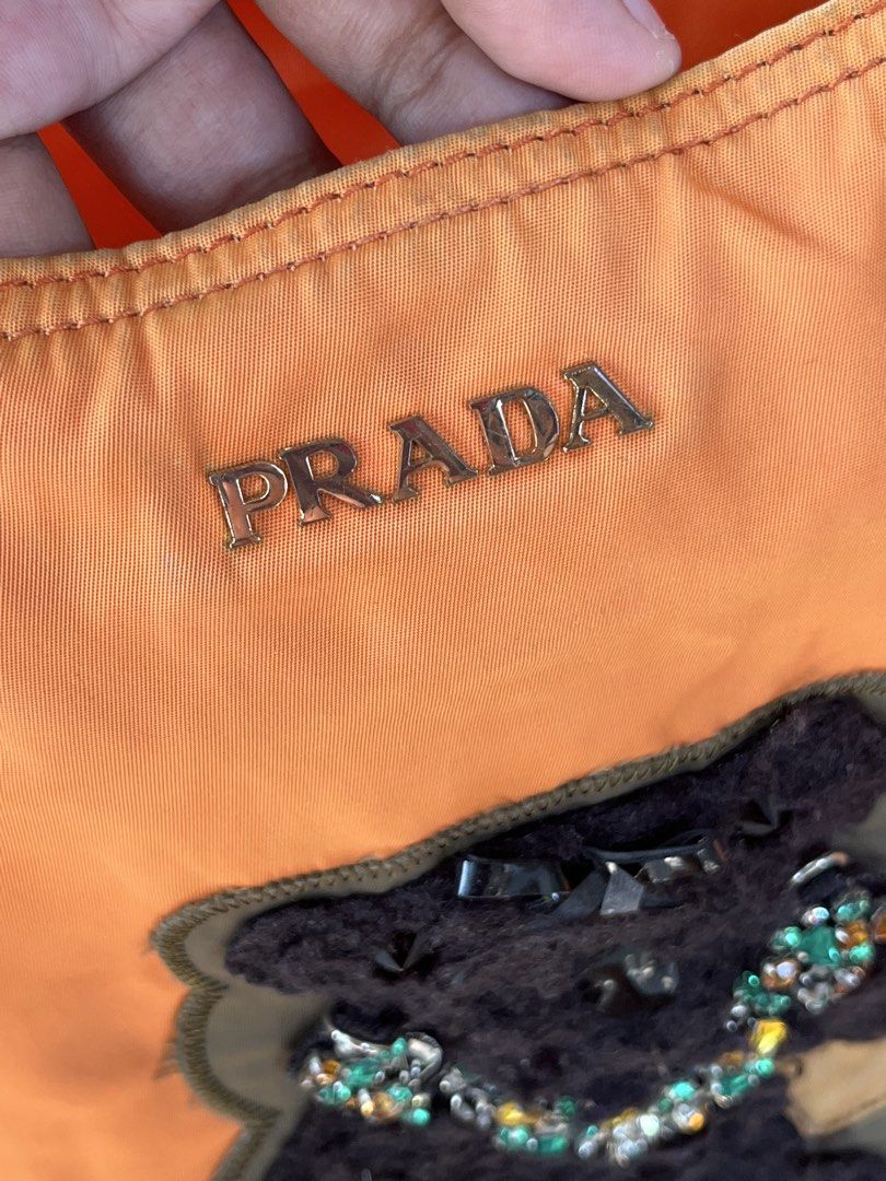 Prada bear orange tote bag (Category: Luxury Bags & Wallets) located in Cagayan de Oro. Submitted by prelovedukayukaybags_cdo (Listing ID 1456106634, Image 3). Description: .