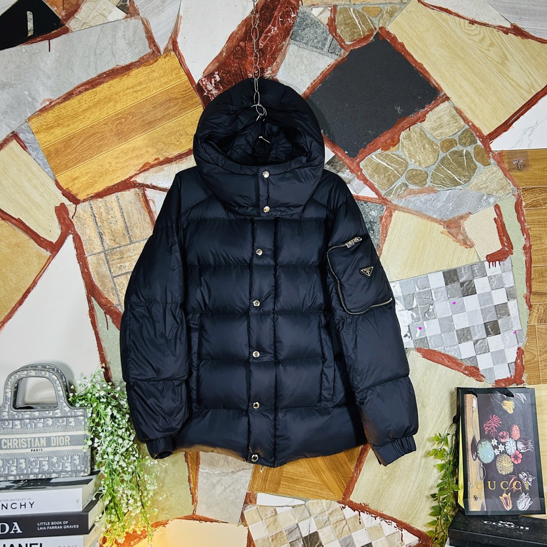 Prada puffer jacket, Luxury, Apparel on Carousell