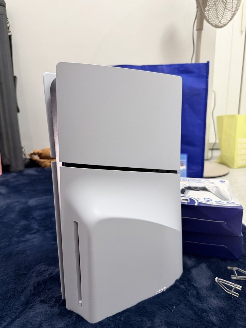 PS5 Slim 1Tb Dual Controller (Category: PlayStation) located in Imus. Submitted by allysadiana (Listing ID 1456088872, Image 3). Description: PS5 Slim 1TB Dual Controller - Almost Brandnew July 11, 2026 - DOP 1x lang nagamit Inclusion: PS5 Slim 1TB Dual Controller - Complete 3 Free Games - Mafia 3 Sealed - Just Cause 3 - Wolfenstein 2 Transparent Controller Case Charging Dock Slighty Nego RFS: Walang Time Laruin /Impulsive buy.