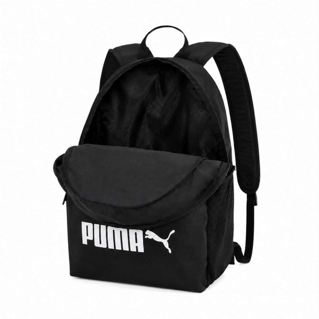 Puma Backpack (Category: Backpacks) located in Quezon City. Submitted by grash.conde (Listing ID 1456176758, Image 2). Description: - Classic black/gray Puma backpack - Wide opening main compartment - Front zip pocket for essentials - Side mesh pocket for water bottle/umbrella - Padded shoulder straps for comfort - Simple and functional design - Ideal for school or everyday use Slightly nego just pm me 📩.