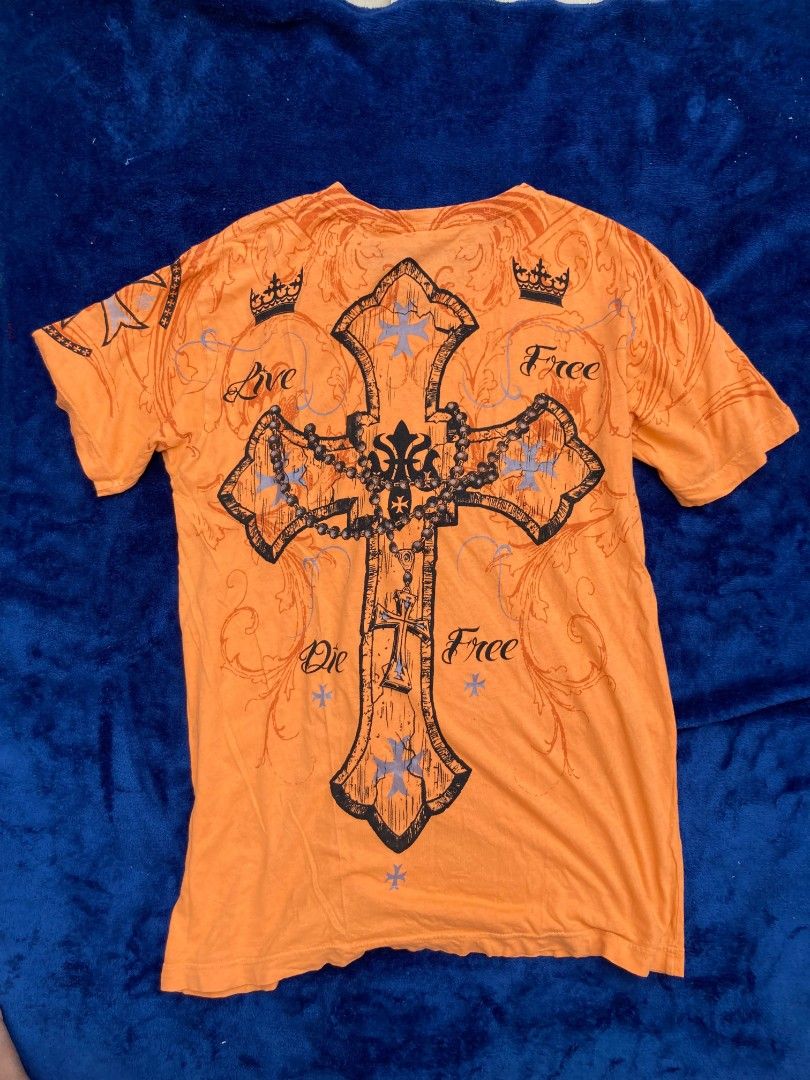 Raw State Premium (Category: Tshirts & Polo Shirts ) located in Naga. Submitted by grunchieeeerr (Listing ID 1456104627, Image 3). Description: Raw State Premium orange graphic tee, size Medium. Features cool cross and text designs on front and back. 19x27.