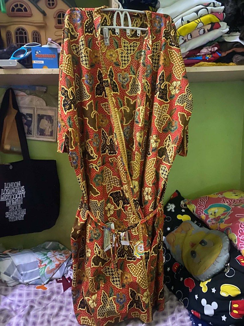 Red Batik Kimono Robe with Belt (Category: Undergarments & Loungewear) located in Caloocan City. Submitted by JennMT (Listing ID 1450361508, Image 3). Description: - Beautiful red kimono robe - Features a traditional batik pattern - Comes with a tie belt to cinch the waist - Made from light and breathable fabric - Versatile: great for lounging or as a stylish cover-up - Unique design, adds a pop of color.