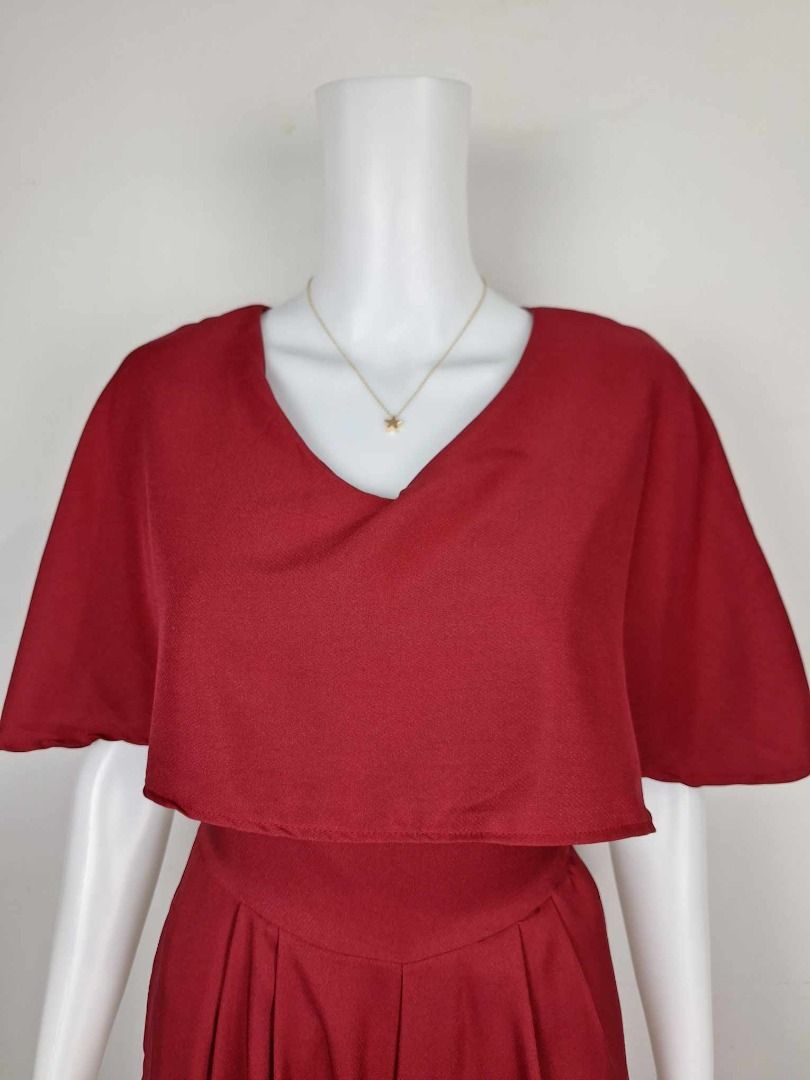 Red Cape Jumpsuit with Wide Legs (Category: Jumpsuits) located in Baguio. Submitted by k.lineph (Listing ID 1456190569, Image 2). Description: - Eye-catching red jumpsuit with a dramatic cape overlay. - Flattering V-neckline. - Chic wide-leg pants for a comfortable and stylish fit. - Elasticated waist with a convenient side zipper. - Functional pockets for your essentials. - Ideal for parties, special occasions, or a glamorous night out. Detailed