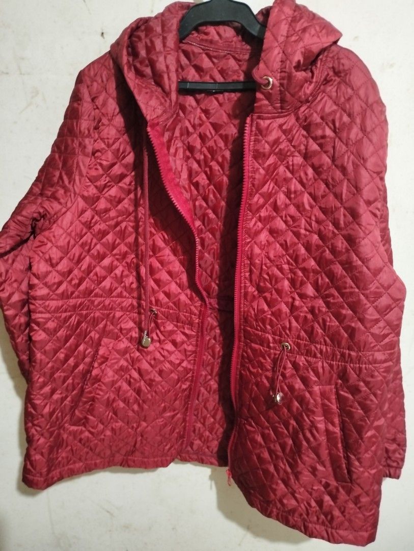 Red Quilted Hooded Jacket (Category: Coats, Jackets and Outerwear) located in Bacoor. Submitted by biala17 (Listing ID 1456090999, Image 3). Description: - Red quilted jacket with hood - Zip-up front - Drawstring waist for a cinched look - Ideal for layering - Comfortable and stylish - Great for cooler weather SUPER SALE NA! 🤝.