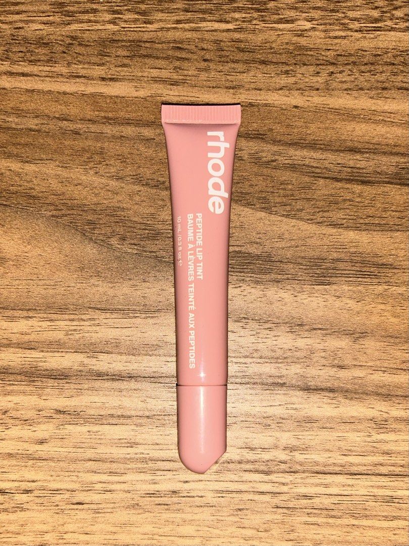 Rhode Peptide Lip Tint in Toast (Category: Makeup) located in Quezon City. Submitted by belleoeli (Listing ID 1456207057, Image 1). Description: -80% full - rarely used - 100% orig w box - rfs: not my shade 🥲.
