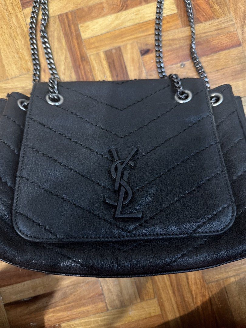 Saint Laurent Black Chain Bag (Category: Luxury Bags & Wallets) located in Quezon City. Submitted by branded_closet01 (Listing ID 1456092739, Image 2). Description: - Elegant chevron pattern on front flap - Iconic black YSL logo - Chic silver chain strap - Interior features a main compartment and a smaller pocket - Expertly crafted in Italy - Interior is clean and well-maintained .