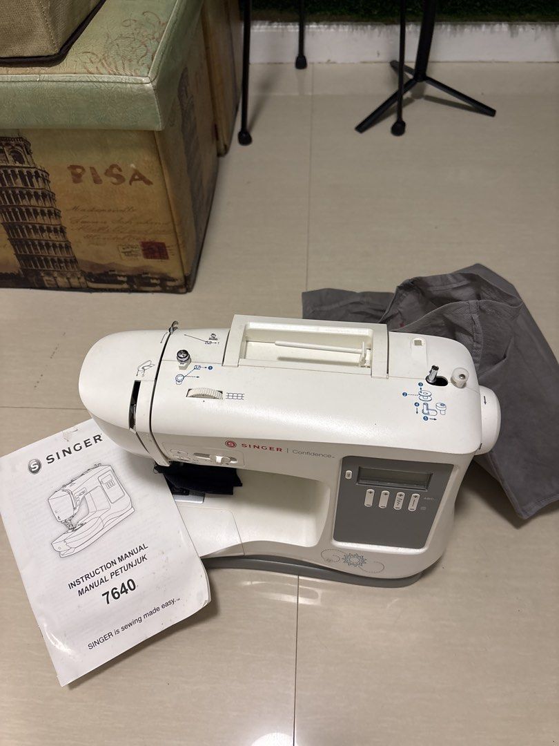 Singer Confidence 7640 Sewing Machine with Accessories (Category: Other Home Appliances) located in Manila. Submitted by ch0431 (Listing ID 1456168413, Image 1). Description: - Stocked for a year need to be checked in Showroom for changing thread settings. Barely used though - Singer Confidence 7640 sewing machine - Includes: Instruction manual, foot pedal, extension table, dust cover - Features numerous stitch patterns for diverse projects - Ide