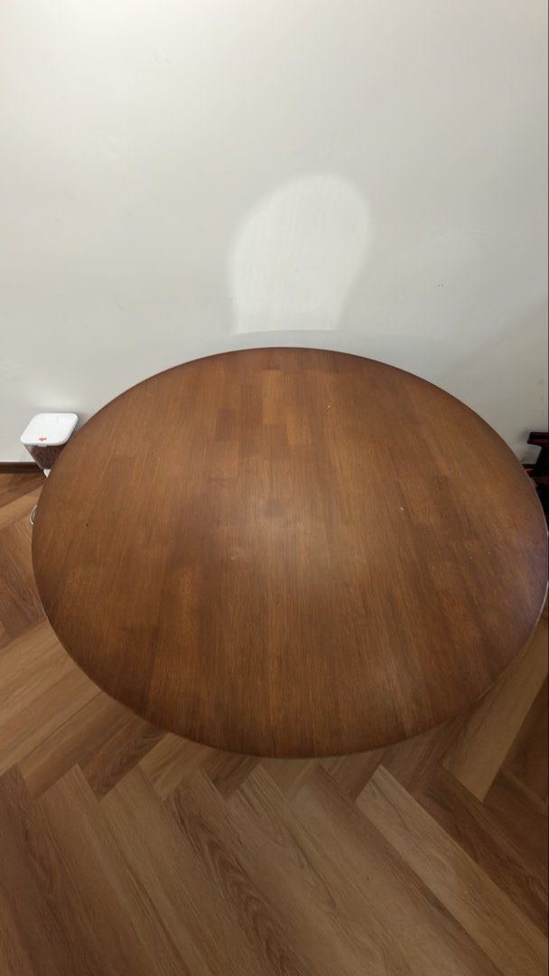 Solid wood round dining table (Category: Tables & Sets) located in Kuala Lumpur. Submitted by almarinik (Listing ID 1456066338, Image 3). Description: Selling my one year old dining table. Comes with 4 solid heavy wooden chair. Got defect during installation, accidentally used wrong screw and protruded a bit (last photo).